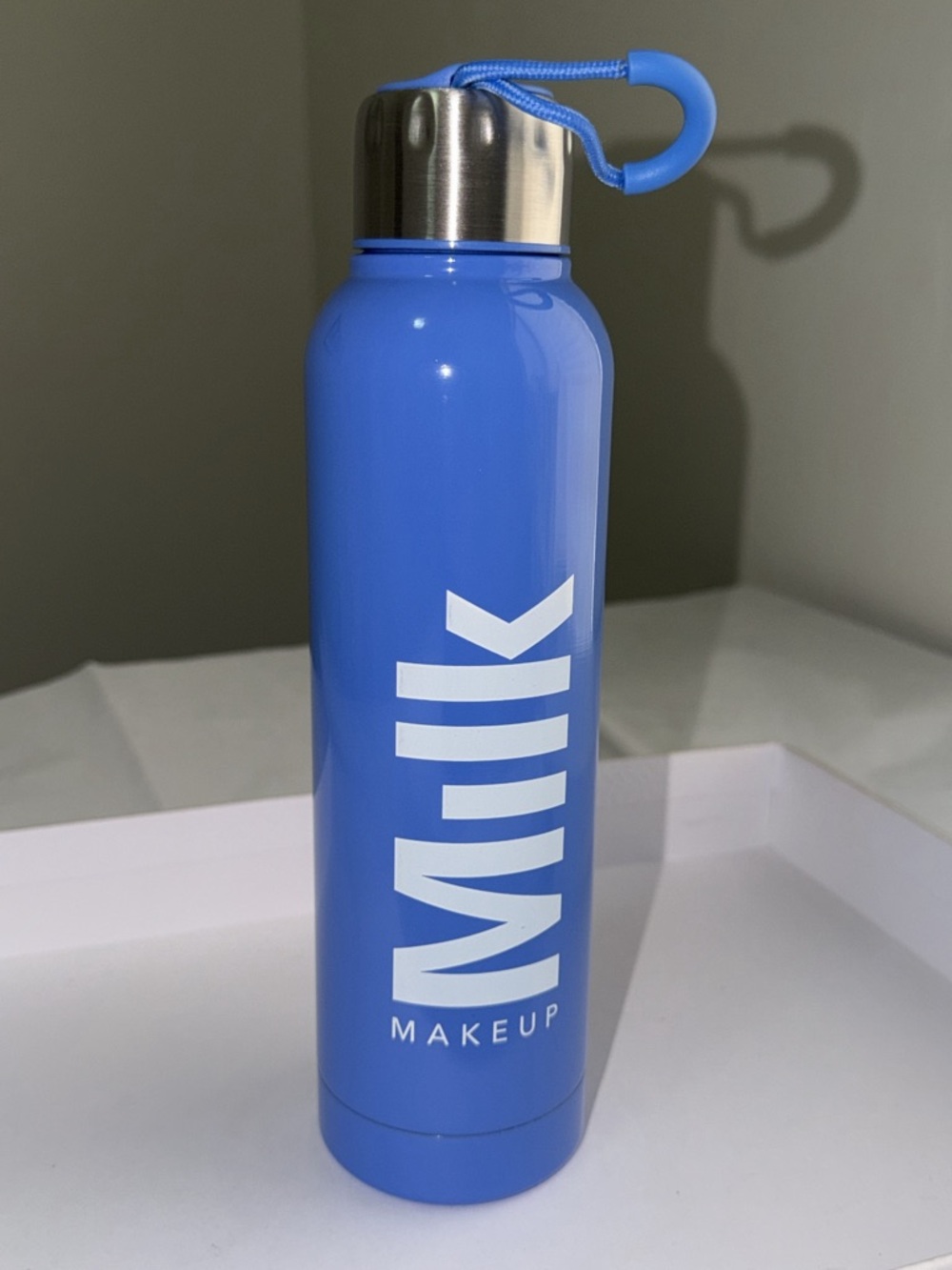 New,unused & authentic Milk Makeup Blue Insulated Water Bottle with White Logo